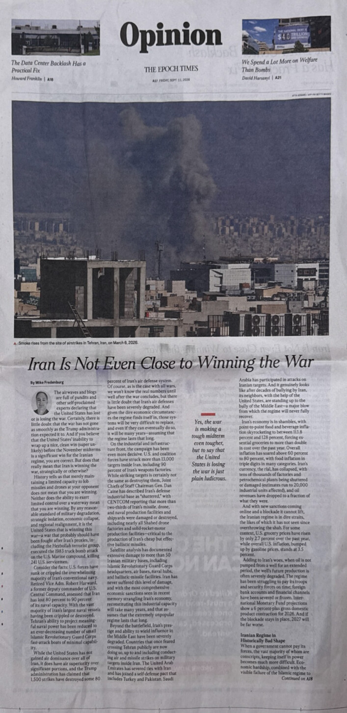 A newspaper opinion page from The Epoch Times with an article titled "Iran Is Not Even Close to Winning the War." The page includes a large photograph of smoke rising from a cityscape, identified as Tehran, Iran, following airstrikes on March 6, 2026. The page also features smaller opinion pieces with titles "The Data Center Backlash Has a Practical Fix" and "We Spend a Lot More on Welfare Than Bombs." The main article discusses the military situation and strategic challenges faced by Iran.