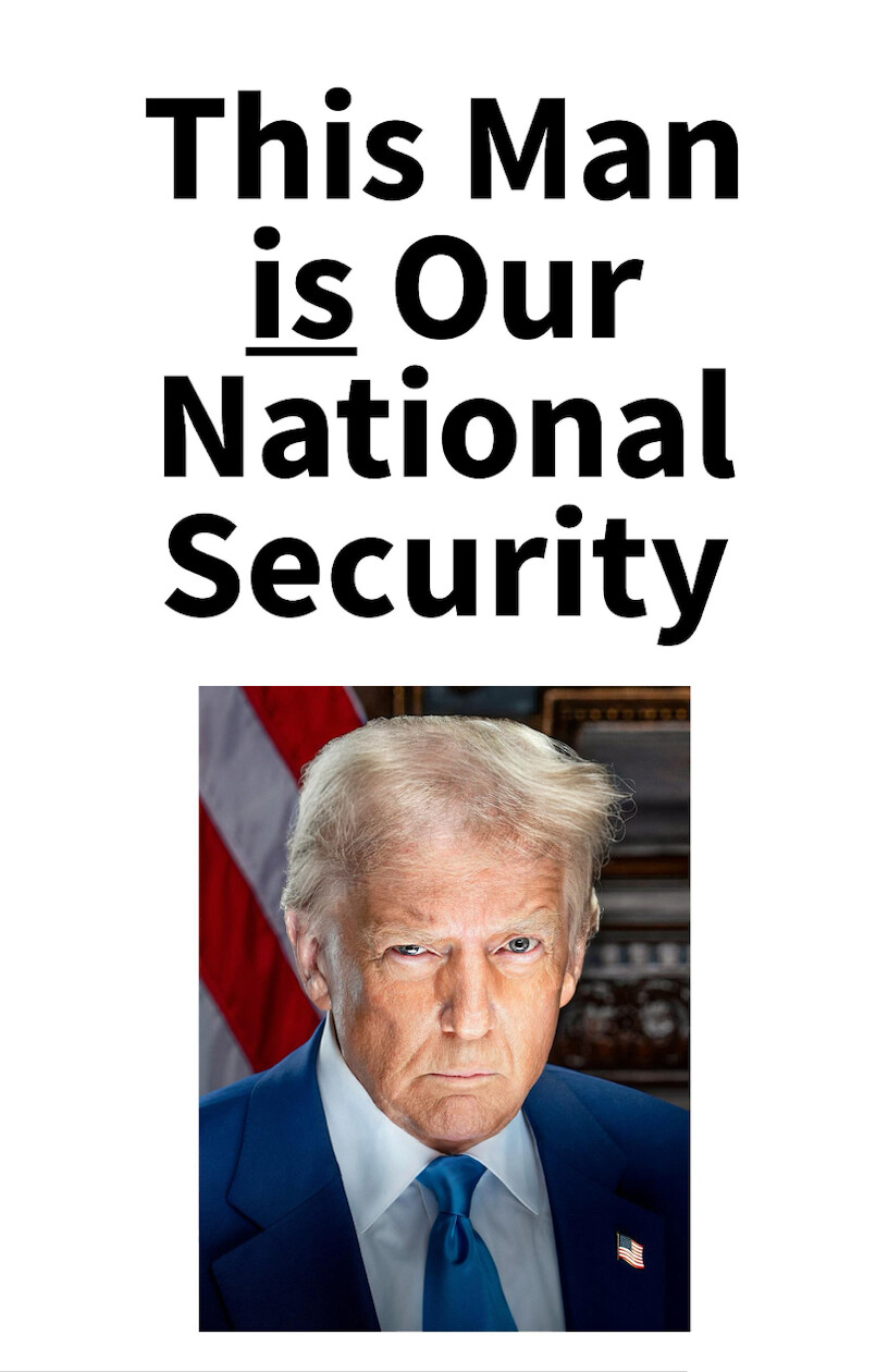 This is a piece of graphic art. The top text reads: "This Man is Our National Security." Below the text, there is an image of a man with light hair, wearing a blue suit and tie with an American flag pin on the lapel. An American flag is partially visible in the background.
