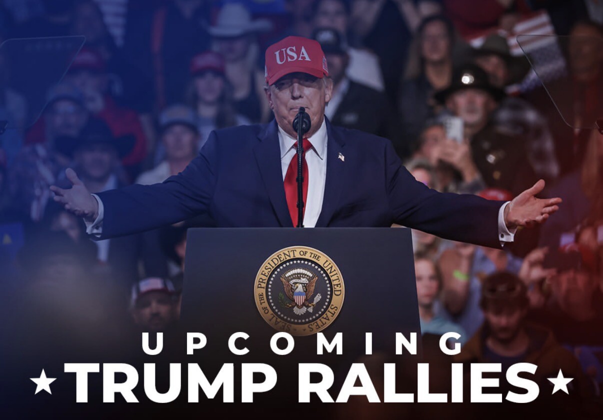 A person wearing a red cap labeled "USA" stands at a podium with the seal of the President of the United States. The person has their arms outstretched, speaking to an audience, some of whom are wearing red hats. Text reads "UPCOMING TRUMP RALLIES" at the bottom of the image.